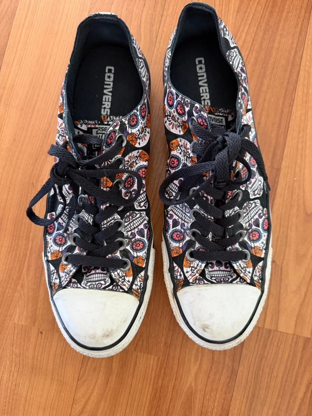 Converse mens  Low Top Sneakers in Black with Orange and Purple Skull Pattern